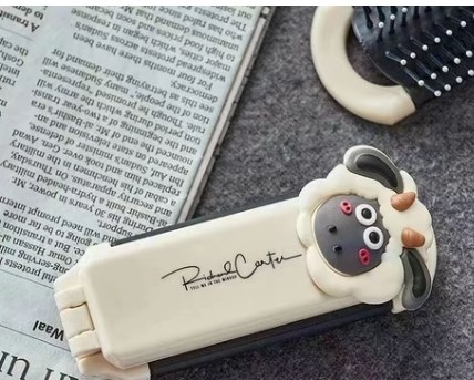 [40850129] Cepillo de pelo plegable con diseño de oveja.